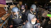 Violence flares at UCLA as police end protests at New York's Columbia