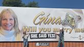 Warsaw man proposes to girlfriend with billboard