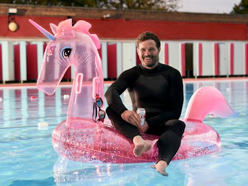 Fify Shades star Jamie Dornan rides a pink inflatable unicorn as he becomes the new face of Diet Coke