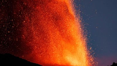 Mount Etna spews lava and ash into air as spectacular eruption unfolds