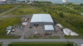 Weed company building large grow center here merges with Fla. company