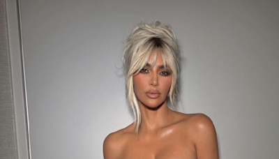 Kim Kardashian just underwent a major beauty transformation with butt-skimming red hair