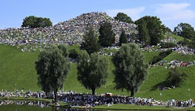 Taylor Swift fans swarm hill in Munich, claiming a high perch for watching concert for free