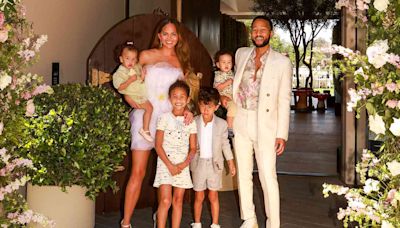 Chrissy Teigen and John Legend Pose with All 4 Kids at Mad Hatter-Inspired Mother’s Day Tea Party