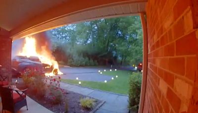 Video shows Nissan SUV catch on fire in family's driveway; carmaker is investigating
