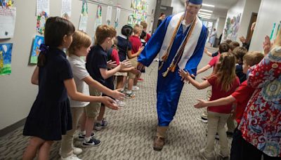 McAuley High seniors reflect on school during Warrior Walk