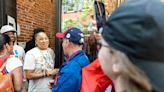 Fans lined up for hours to meet legendary basketball coach Dawn Staley at Mitchell & Ness