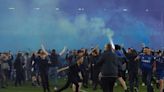 Soccer-English leagues announce tougher sanctions on smoke bombs, invasions