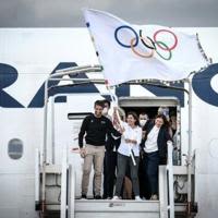 Paris mayor Anne Hidalgo, a flag-waver for social businesses and the Olympics, brought Yunus on board