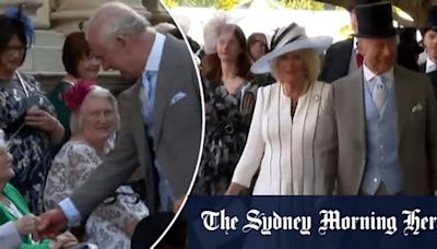 King Charles and Queen Camilla greet guests at Buckingham Palace Garden Party