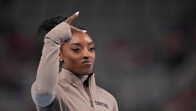 Simone Biles cruises to 9th national title and gives Olympic champ Sunisa Lee a boost along the way