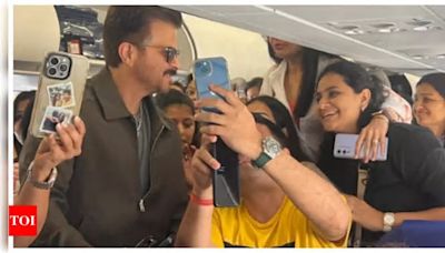 Anil Kapoor wins hearts as he graciously obliges fans with selfies on a flight; See pics