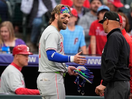 Rockies beat Phillies 3-2 in 11 innings after Philadelphia star Bryce Harper ejected in 1st