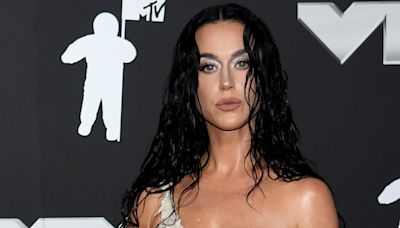 Katy Perry wows in a shredded bra top and skirt on the 2024 VMAs red carpet