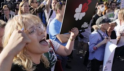 Women's rights groups protest against abortion law in Poland