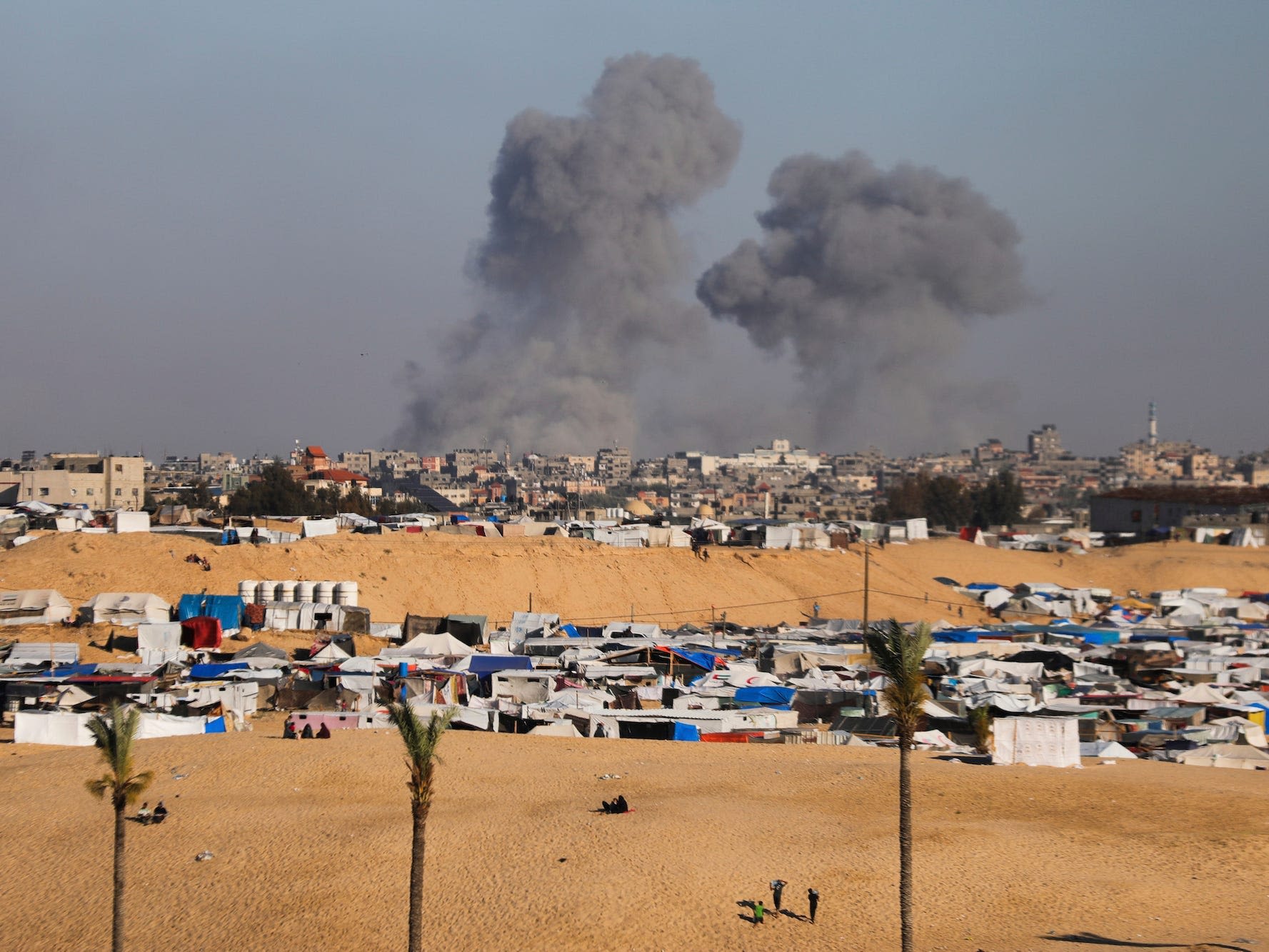 Israel and Hamas are pushing forward with tense cease-fire talks despite Israel's military incursion into Rafah