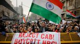 Protests in India as Modi enforces migration laws that exclude Muslims