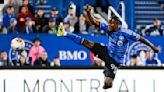 Acosta scores on a penalty kick in second-half stoppage time to help Cincinnati tie Montreal 1-1