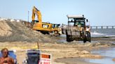 ‘It’s going to be a game-changer’: Chesapeake Bay beach plagued by erosion gets a dose of sand