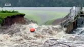 People evacuated in southeastern Wisconsin community after floodwaters breach dam