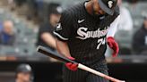 White Sox designated hitter Eloy Jiménez looks at his bat while flying out in the sixth inning against the Nationals at Guaranteed Rate Field in the first game of a doubleheader on May 14, 2024, in Chicago.
