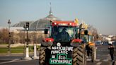 Farmers drive tractors through Paris in protest at pesticide bans