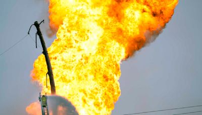 Flames from massive pipeline fire near Houston subside but continue burning