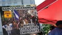 Anti-Hernandez protesters gathered outside the Manhattan courthouse ahead of sentencing brandishing placards decrying the former head of state's crimes