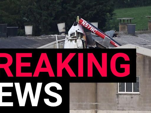 Helicopter crashes into building causing several serious injuries