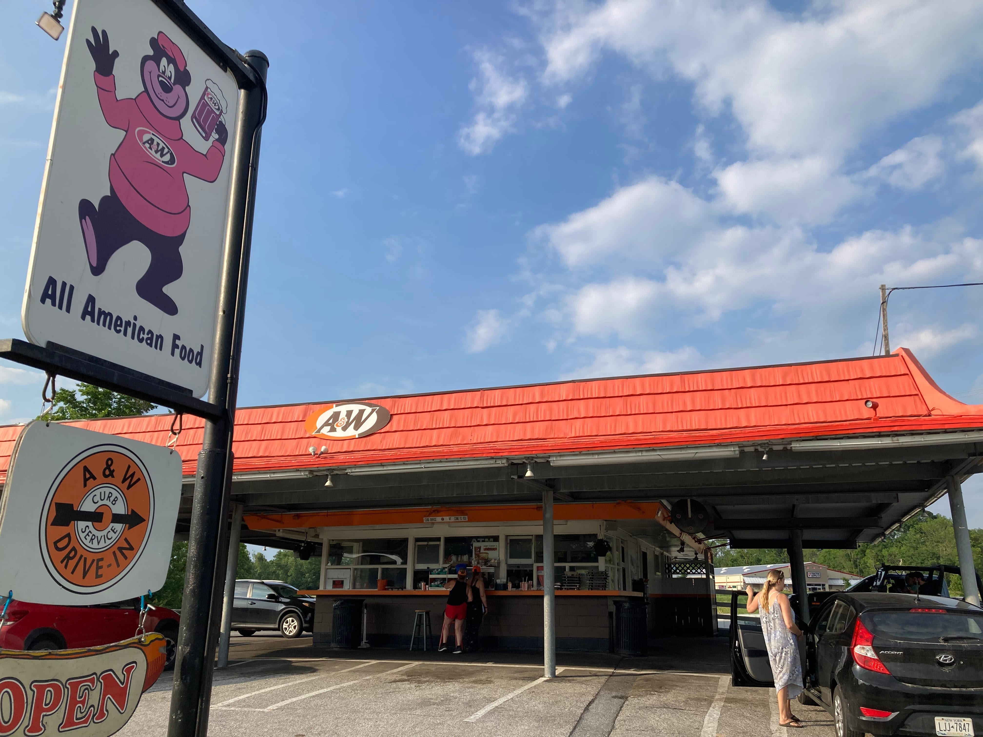 An old-school slice of summer: A&W drive-in doles out dinner right to your car window