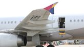 S.Korean court issues warrant for man who opened Asiana plane door mid-air -Yonhap