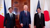 Biden warns on Beijing's South China Sea moves in Philippines-Japan summit