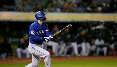 Corey Seager hits a 3-run homer in the 8th inning to rally the Rangers past the A s 4-2