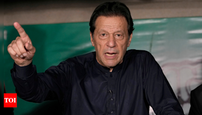 Imran Khan accused of conspiring to spread anarchy from prison, claims PM's aide - Times of India