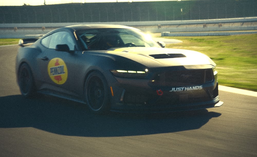 Logano experiences hand-control Mustang with Torsten Gross