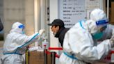 Chinese city plans 250,000 quarantine beds to fight virus