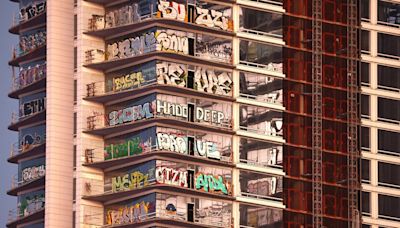 Exclusive | An Unfinished Skyscraper Complex Covered With Graffiti Finds a Lifeline