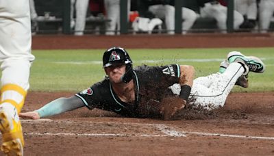 Arizona Diamondbacks capitalize on wild pitches, rally for series-opening win over Rockies