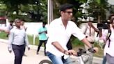 Vishal arrives on a bicycle to attend South Indian Artist Association meeting in Chennai. Watch