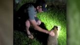 Video: Michigan men rescue wild raccoon choking on food