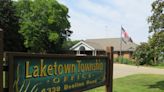 How will Laketown Township go about selecting a new trustee?