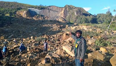 Rescue teams arrive at site of massive landslide in Papua New Guinea