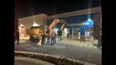 Stolen excavator was driven through 2 buildings, including Walmart, Florida cops say
