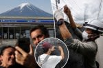 Visitors are making peepholes in Mount Fuji barrier designed to stop obnoxious, selfie-taking tourists
