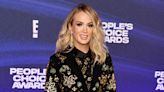 Carrie Underwood Glitters in Gold With Unexpected Pantsuit at the 2022 People's Choice Awards