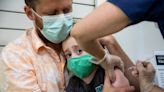 Most U.S. kids still haven’t received a flu or COVID vaccine. It’s helping fuel a tripledemic that’s slamming hospitals nationwide