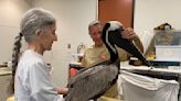 Brown pelican found on Marco beach with possible red tide poisoning