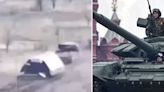 A Russian tank was seen charging into battle with a giant, makeshift metal roof on top of it as Ukraine leans into drone attacks