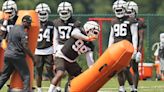 Browns defensive end Za'Darius Smith injures left knee in practice, driven off field in obvious pain