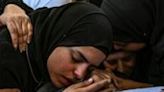 A woman mourns a man killed during an Israeli raid on the Nur Shams refugee camp in the occupied West Bank